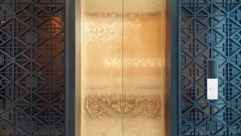 Ornate golden and blue doors, representing personalized access and curated client connections.