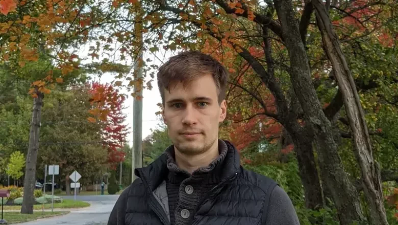 Photo of Robert Timper in a wooded area during autumn, accompanying his comment on BCA’s learning environment.